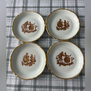 Set of 4 vintage PORCELAINE LIMOGES FRANCE PLATES.